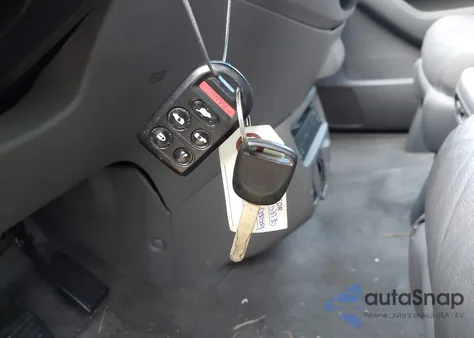 2010 Honda Odyssey Touring z USA, uszkodzony, nr VIN 5FNRL3H99AB058887